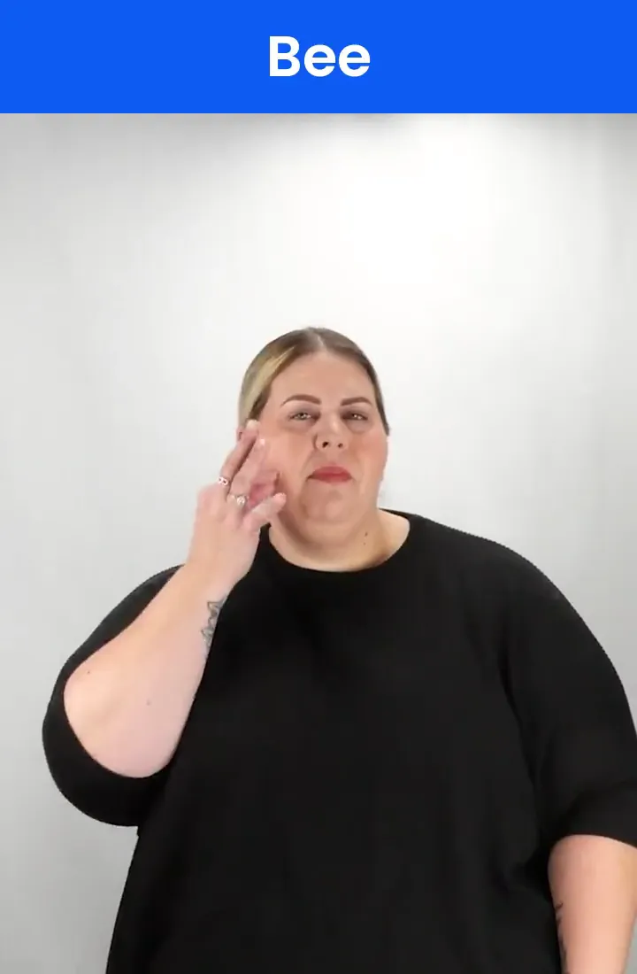 A Deaf signer signs BEE in ASL