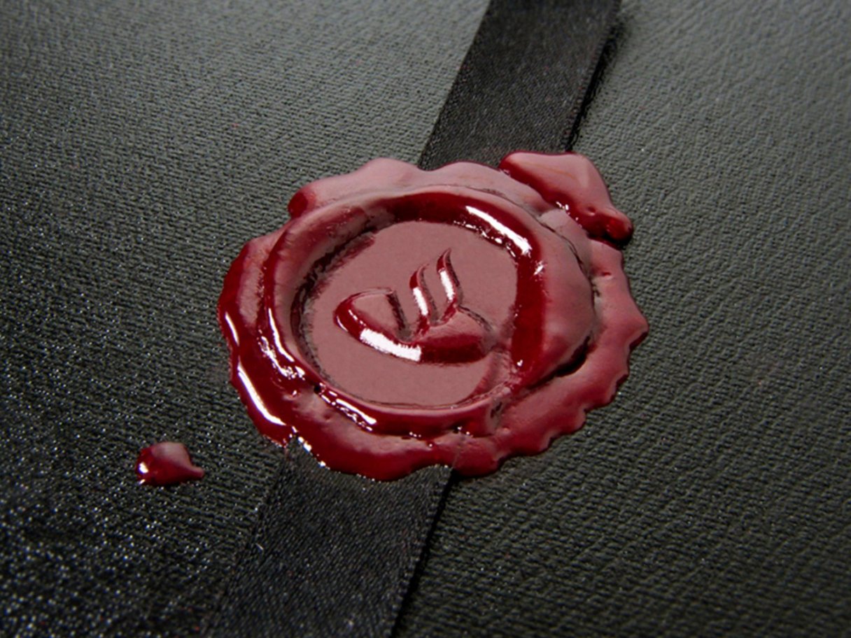 Rooftops of a coastal town with the sea in background