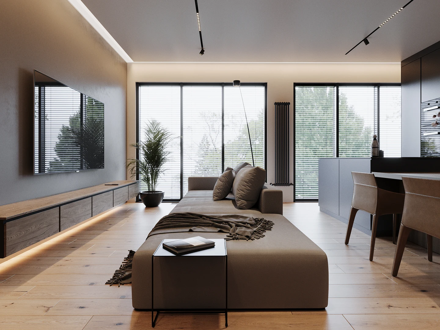 Suspension minimaliste diffusant une lumière douce au-dessus de la table.