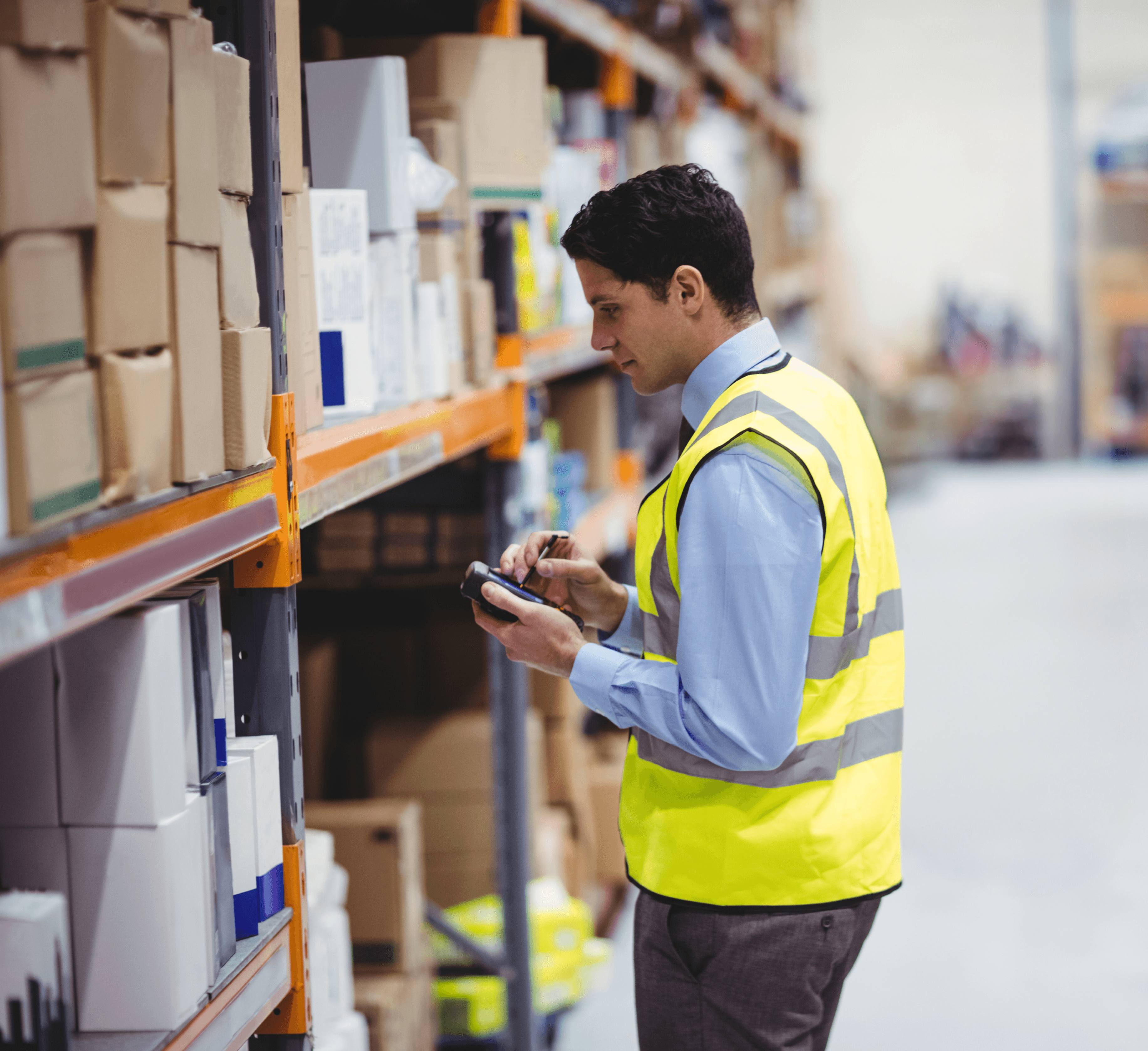Woman in red outfit poses by a red telephone booth.