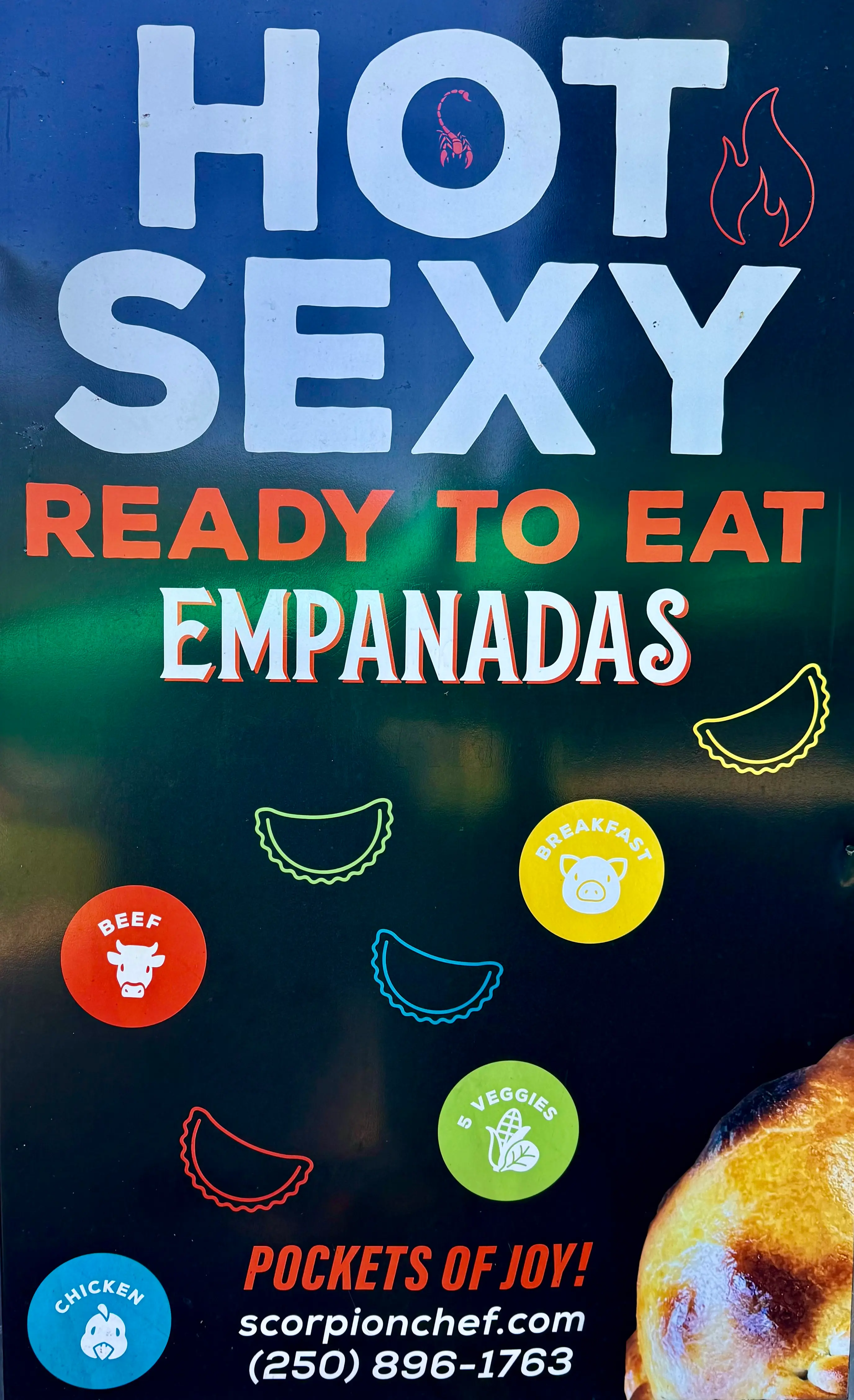 Scorpion Chef hot ready to eat empanadas menu sign showing beef breakfast chicken and five veggies flavours Vancouver Island BC