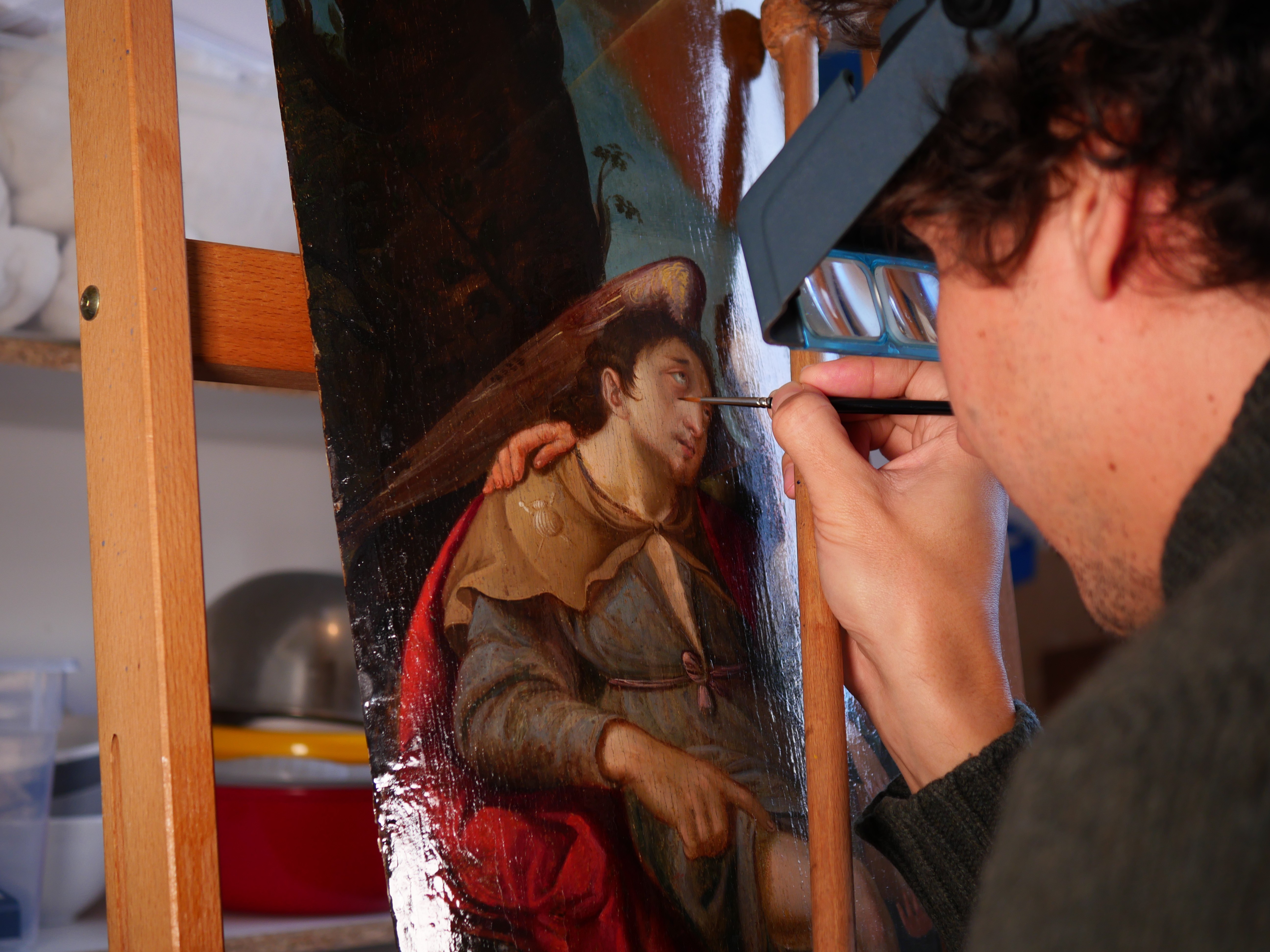 kids lying on a glass land and smiling