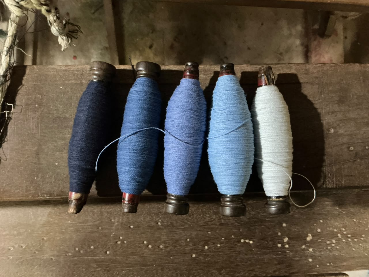 Rolls of yarn in warm tones