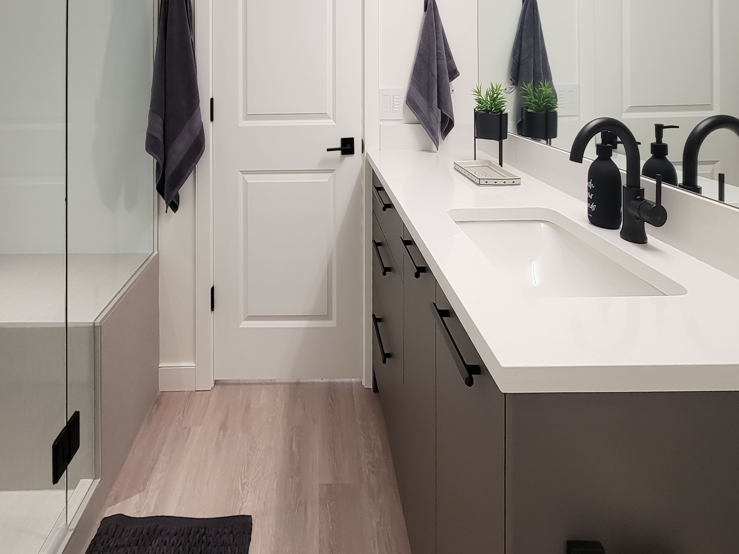 Image of Modern bathroom interior with KHD Homes design-build renovations, featuring spa-like primary ensuites and luxury materials.
