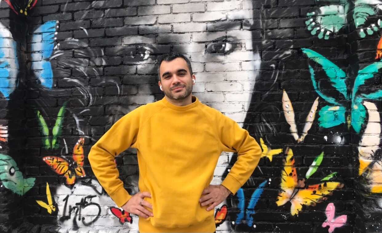  Why is he wearing Airpods? Well, he is always wearing them and constantly on a call, so if you catch Adrien in his natural habitat, he will most likely be wearing those while loudly speaking in French. 