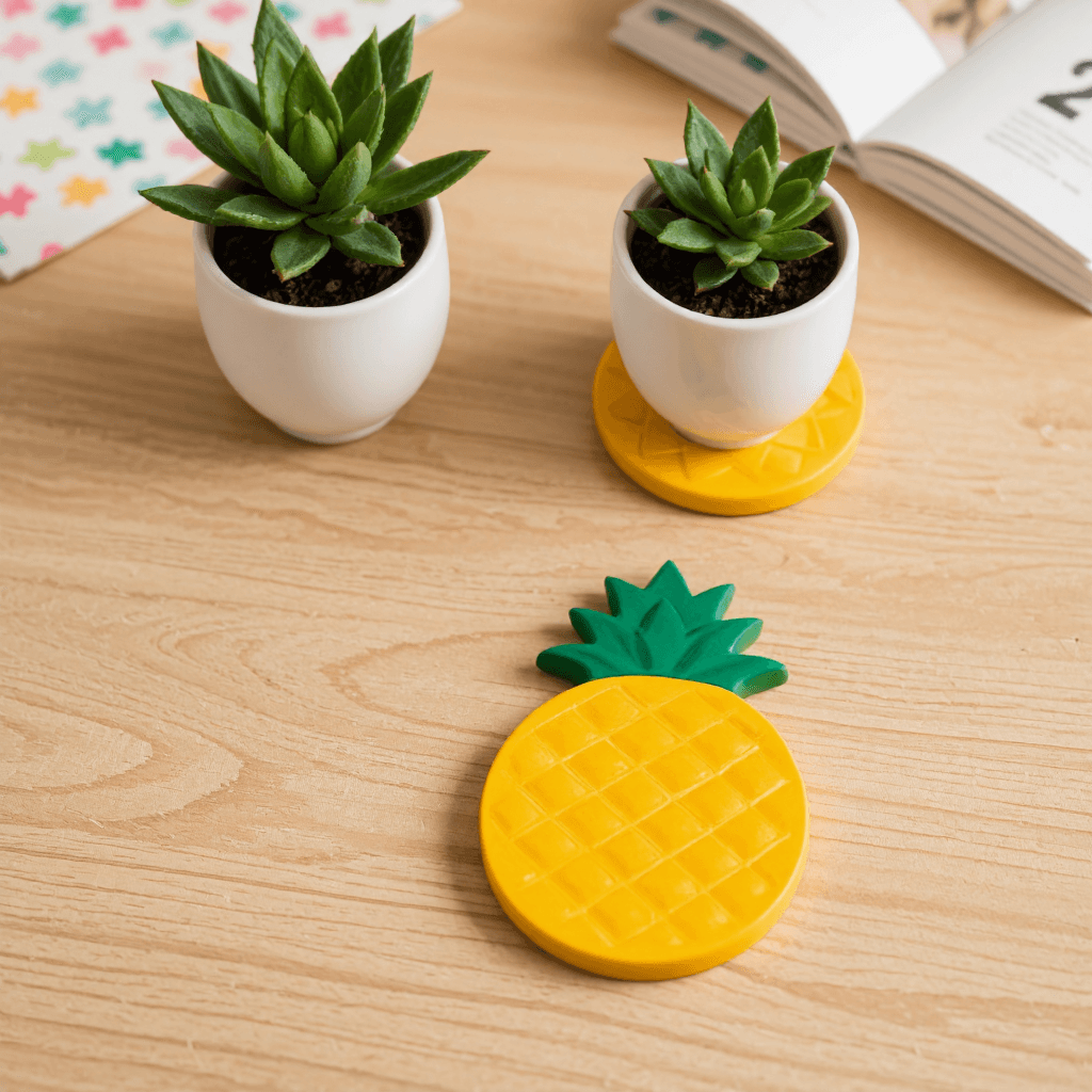 product photography of a set of pineapple-shaped coasters