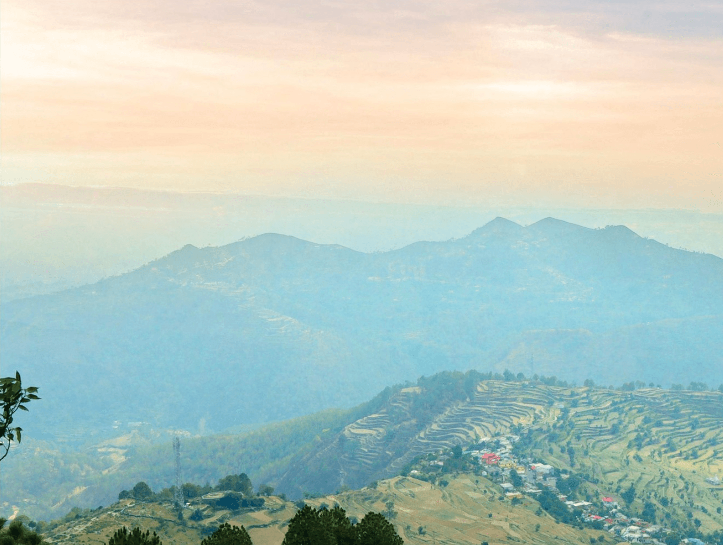 <img src="mountains-sunset.jpg" alt="Towering mountains under a vibrant orange sunset sky, dramatic alpine landscape.">