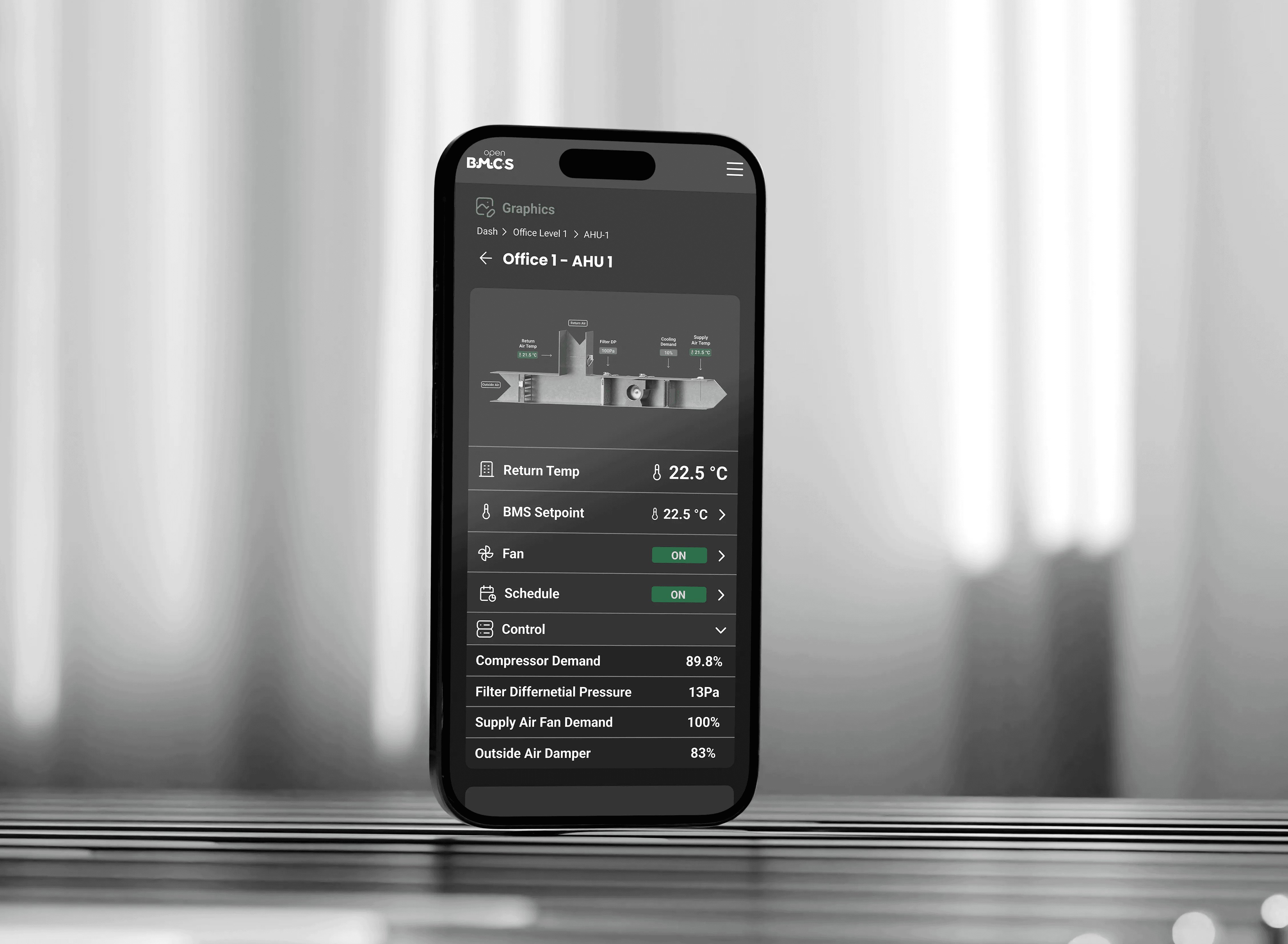 An iPhone displaying an AHU (Air Handling Unit) page from the OpenBMCS Building Management System, featuring interactive controls and detailed mechanical information.