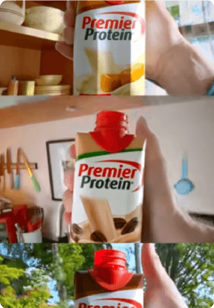 Premier Protein shake with a hand holding it