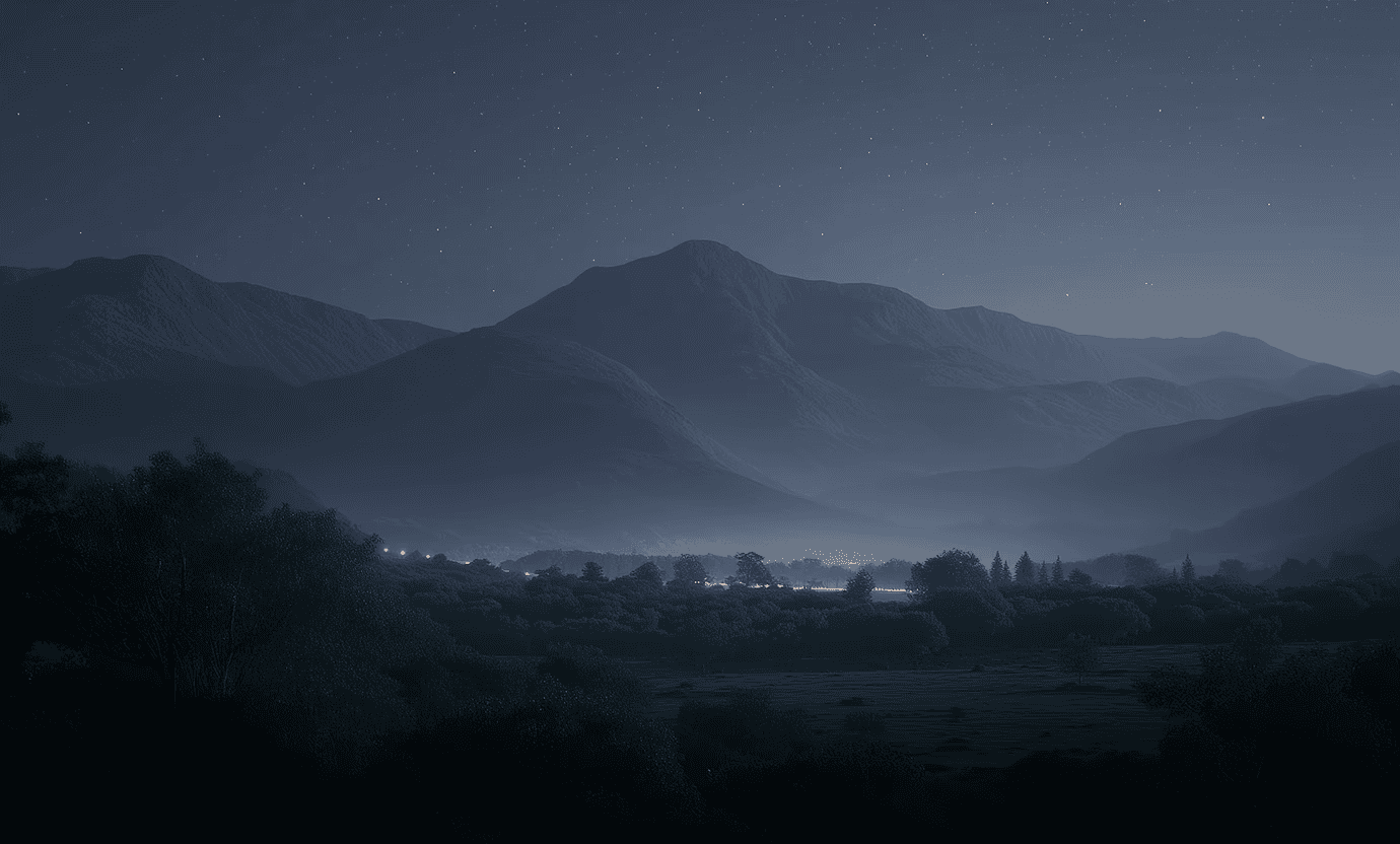 night-sky-over-distant-mountains-and-city-glow