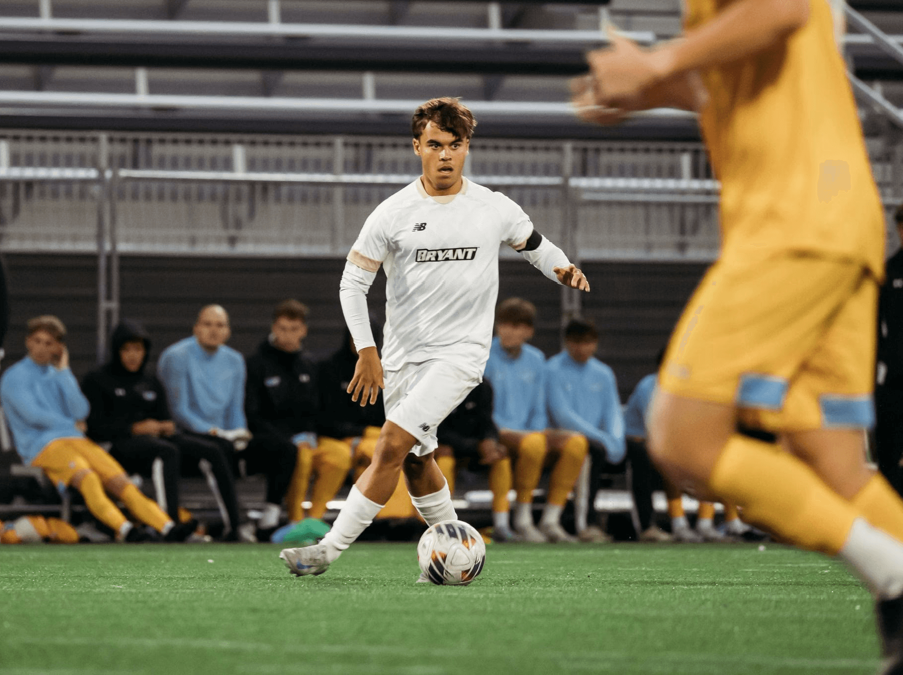 a group of young boys playing a game of soccer