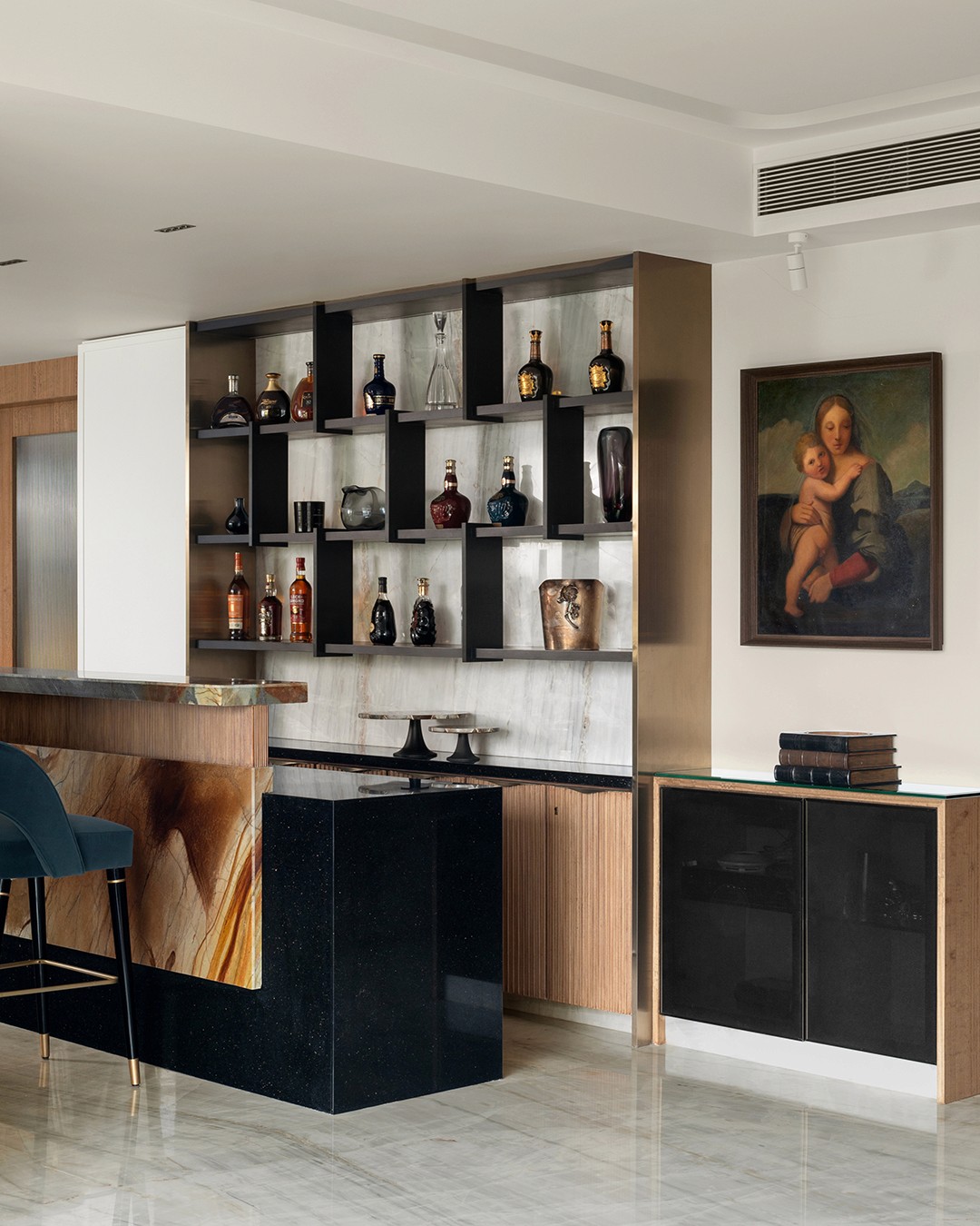 Minimalist dark interior with tiered benches and shelves.