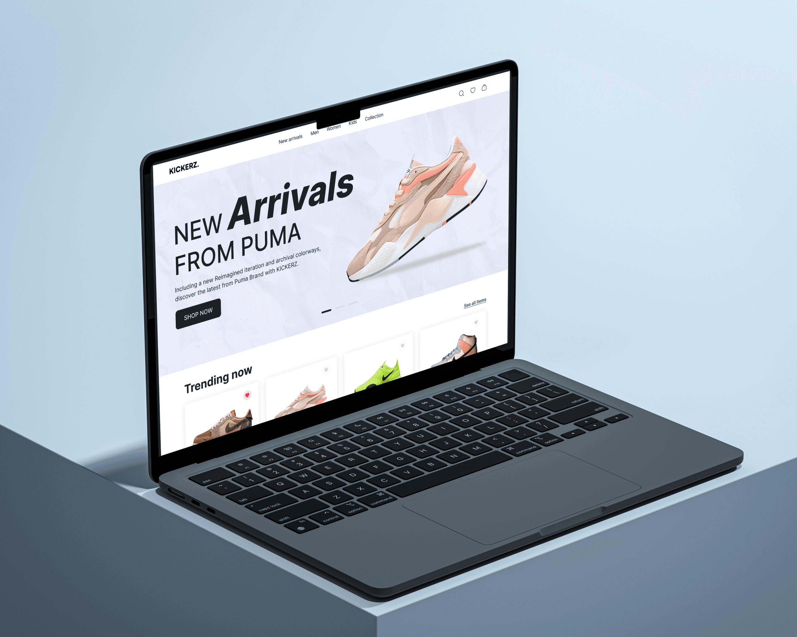 Laptop showing Puma shoe new arrivals on an E-commerce website.