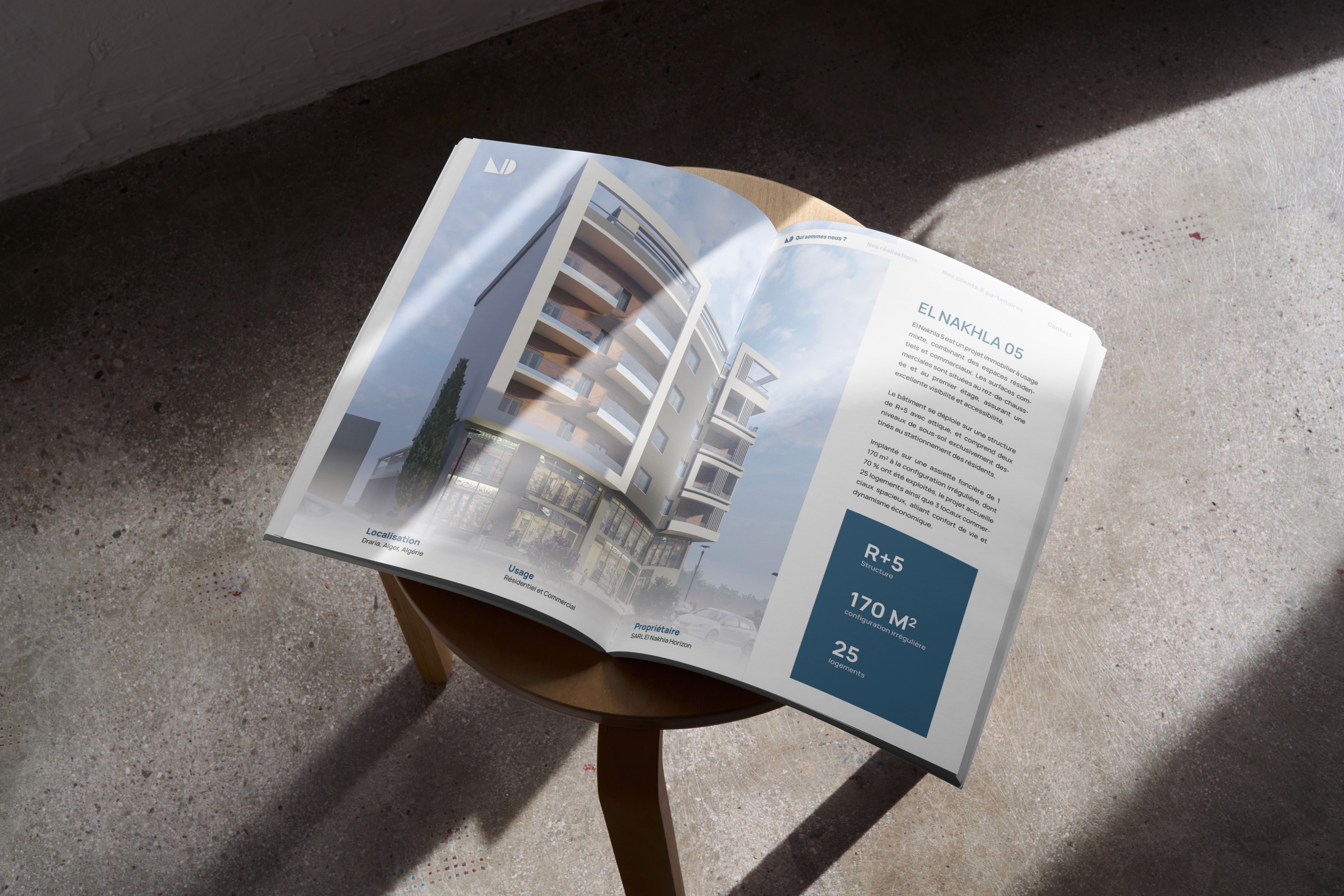 Shiny metallic silver foil pouch lying flat, printed with a large black outline of a smiley face, all set against a bright orange backdrop.