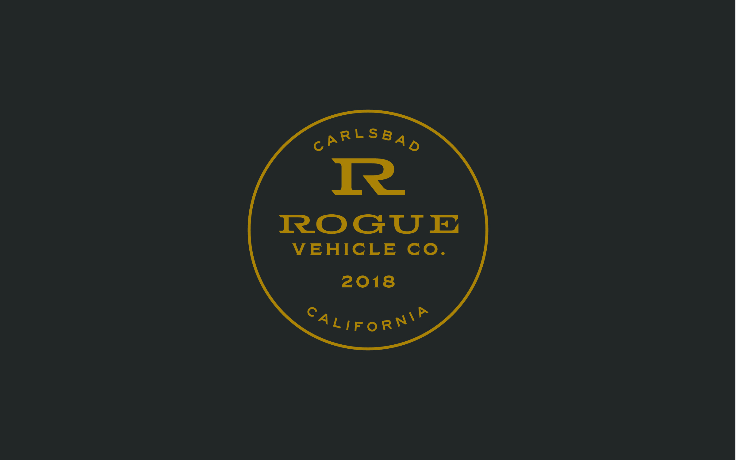 Rogue Vehicle Company circular badge logo in gold on dark background