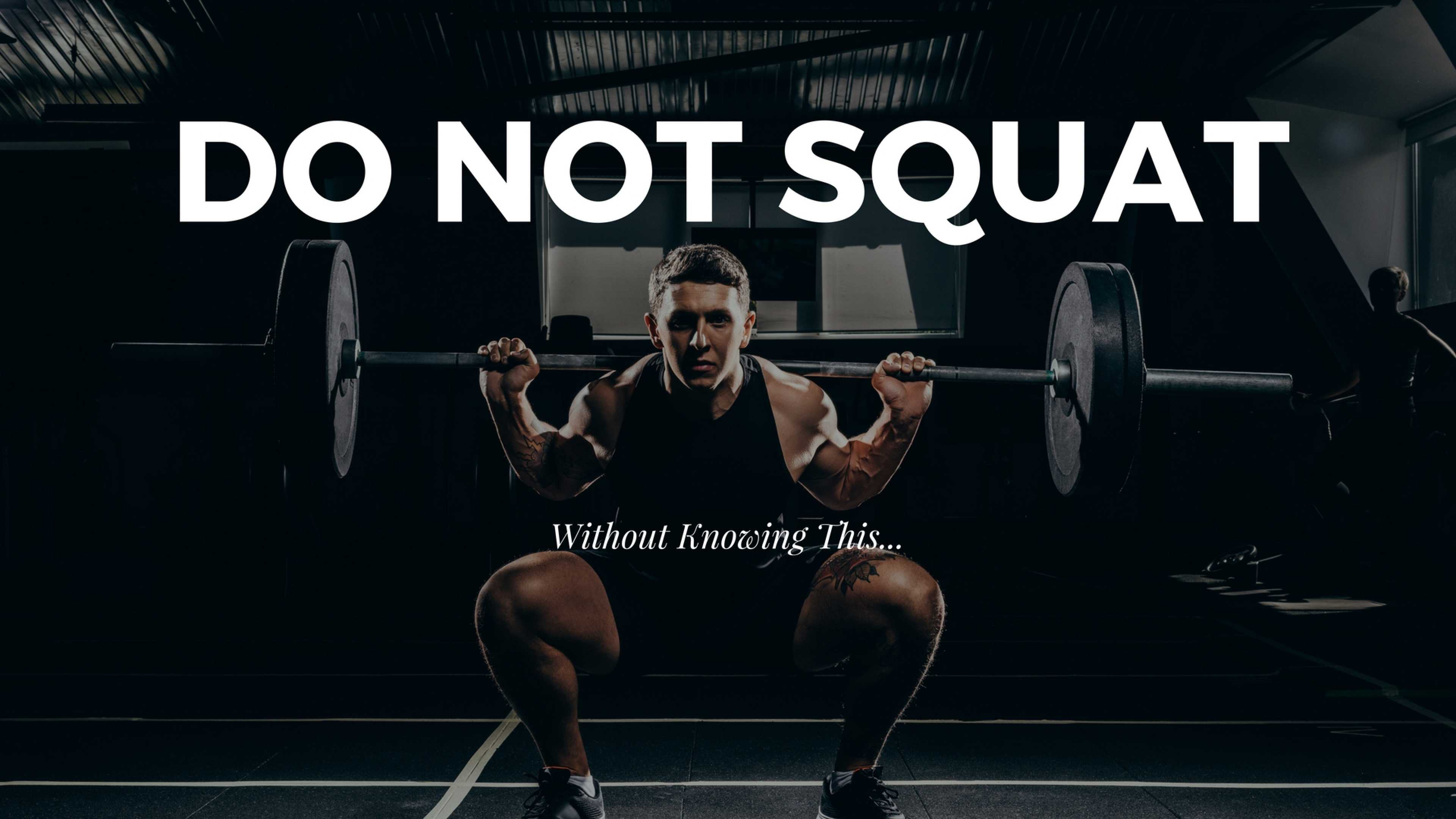 a man doing barbell back squat