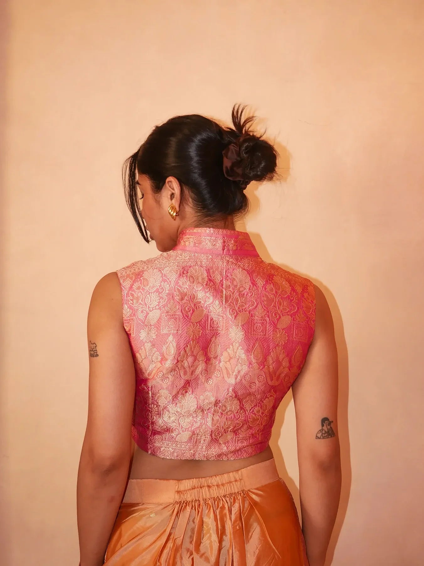 Handcrafted silk co-ord set made from vintage saree with cropped mandarin collar blouse and high-waisted wide-leg trousers.