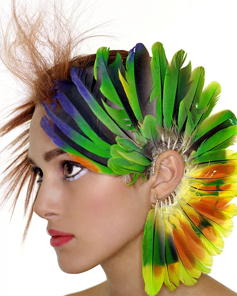 Keira Knightley wearing a vibrant multicolored feather and quill couture headpiece handcrafted by designer Shaun Leane for Tatler magazine editorial, archival art piece.