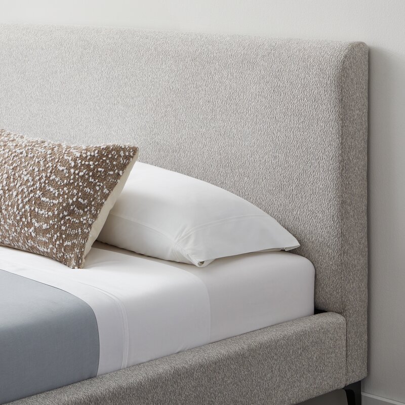 Enjoy a seamless blend of form and function with the garfinkel upholstered platform bed, tailored for you.