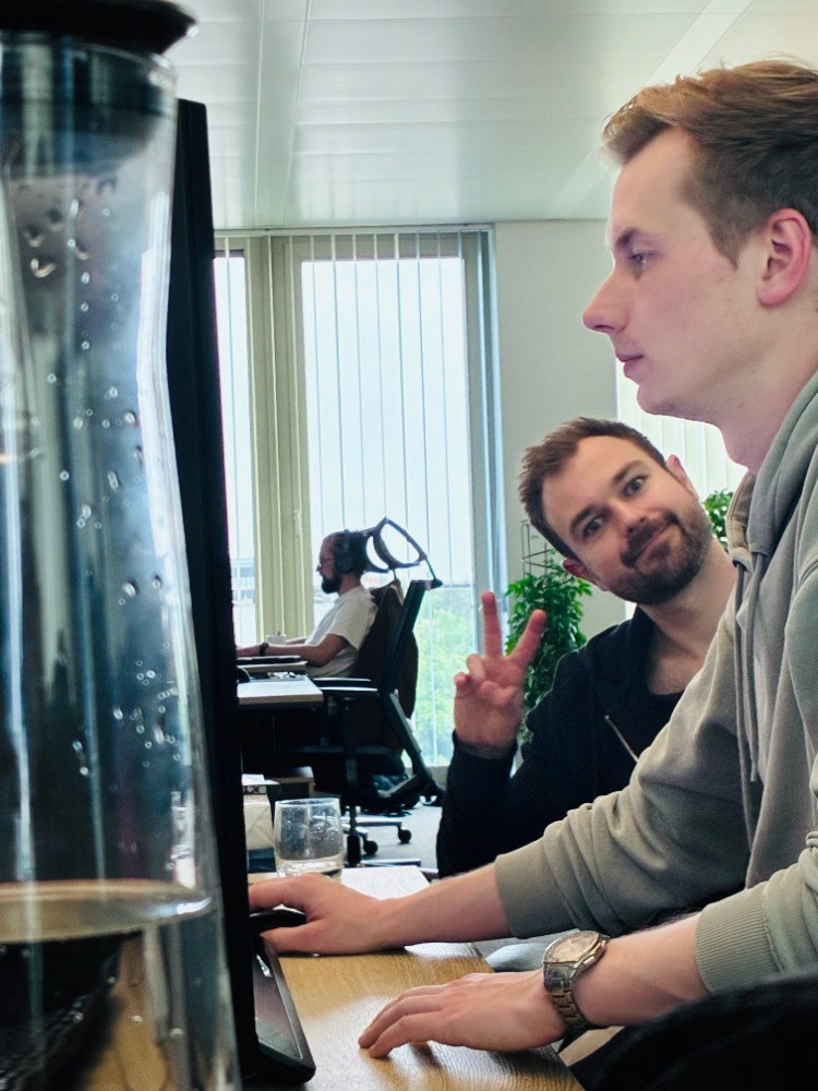 Design and engineering discussion at MUNIQ involving CAD and digital development tools