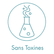 A wooden essential oil diffuser releasing a gentle stream of steam, surrounded by dried herbs and a small bottle of essential oil. The warm lighting enhances the cozy and therapeutic ambiance.