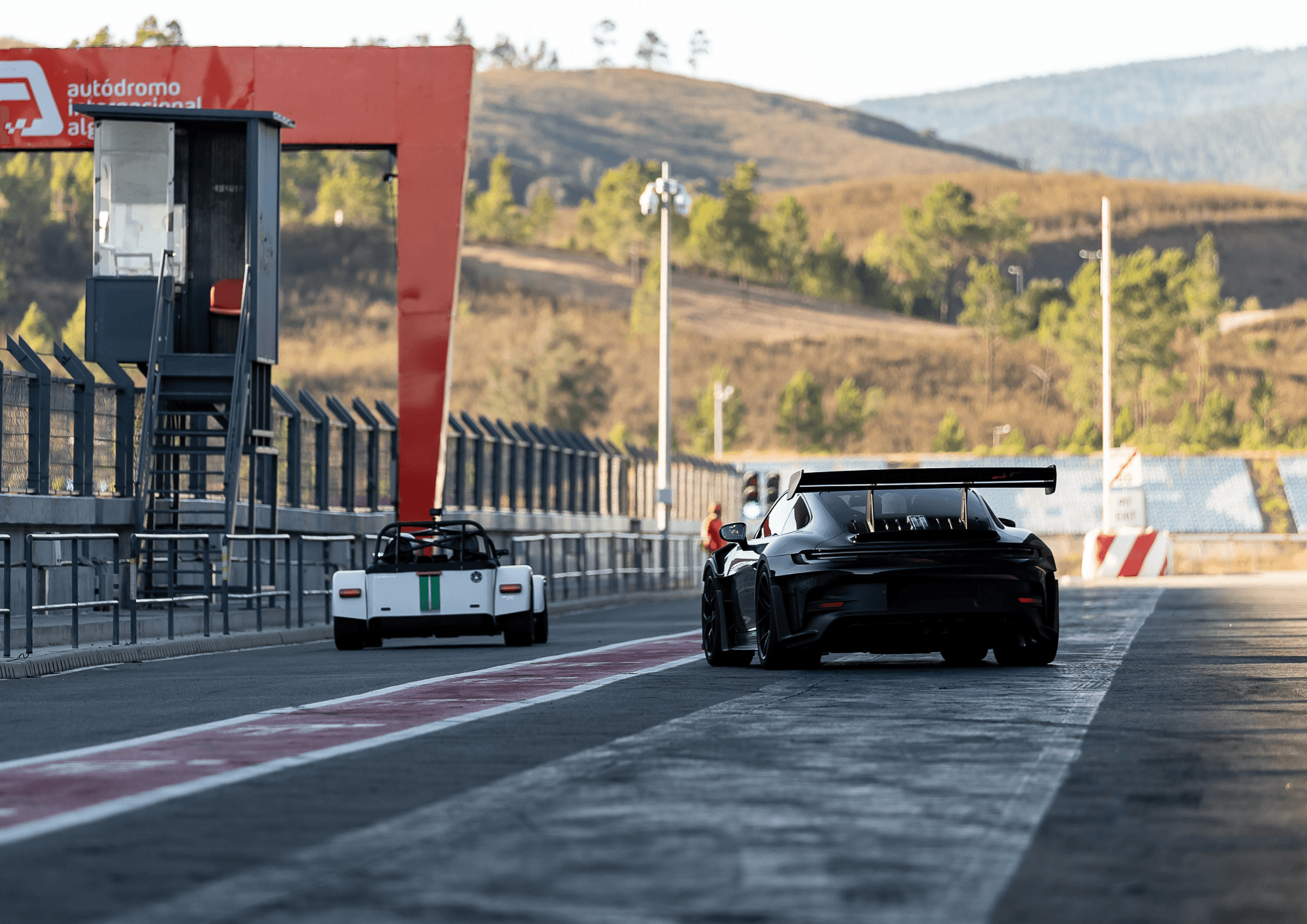 A person picking up a dumbbell in a gym setting, representing strength training, workout focus, and smart, easy fitness progress tracking.
