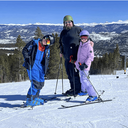 Brian and two kids skiing