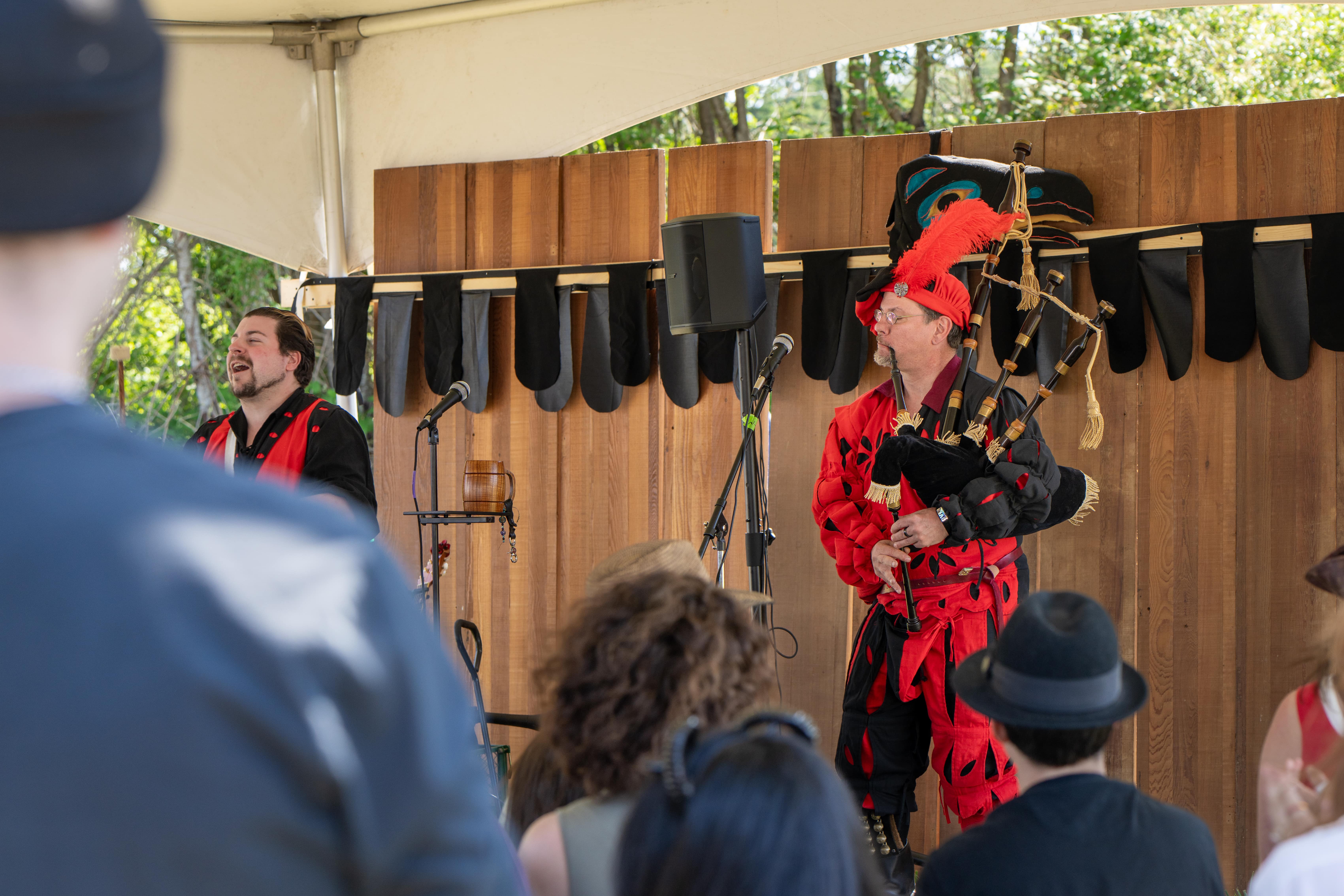 Performer playing bag juggling fire on Stage