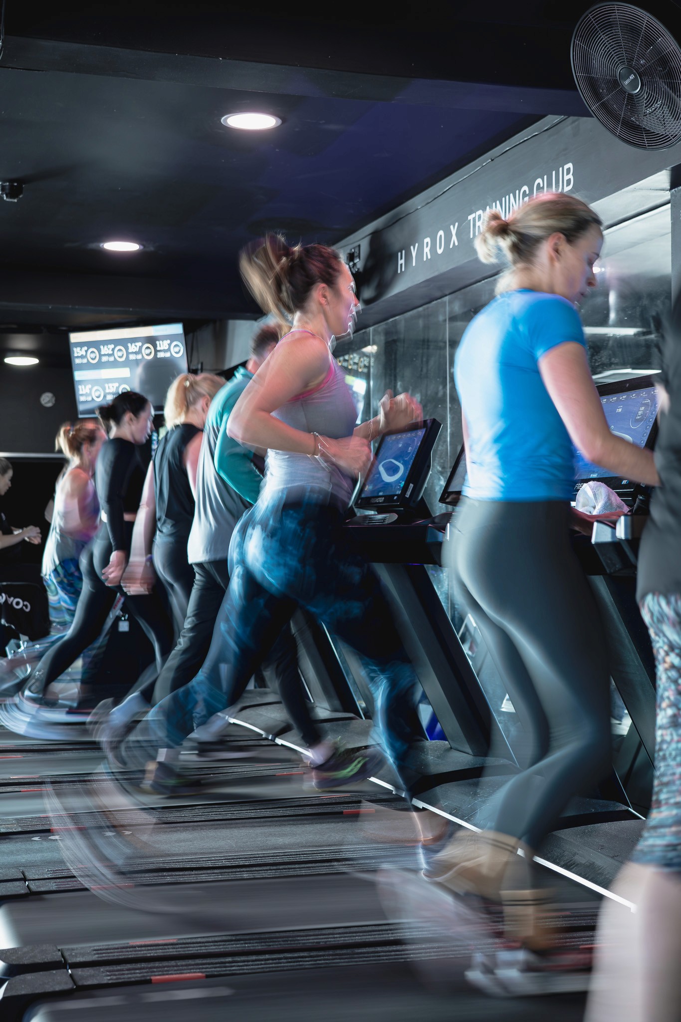Drone shot of a running track at night
