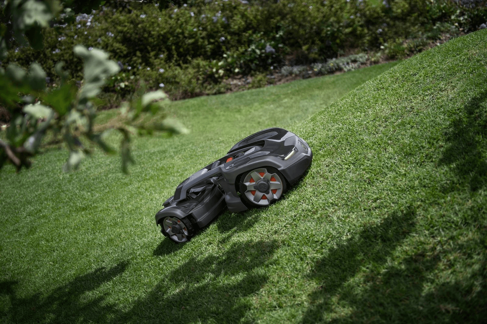 a room filled with lots of black barrels