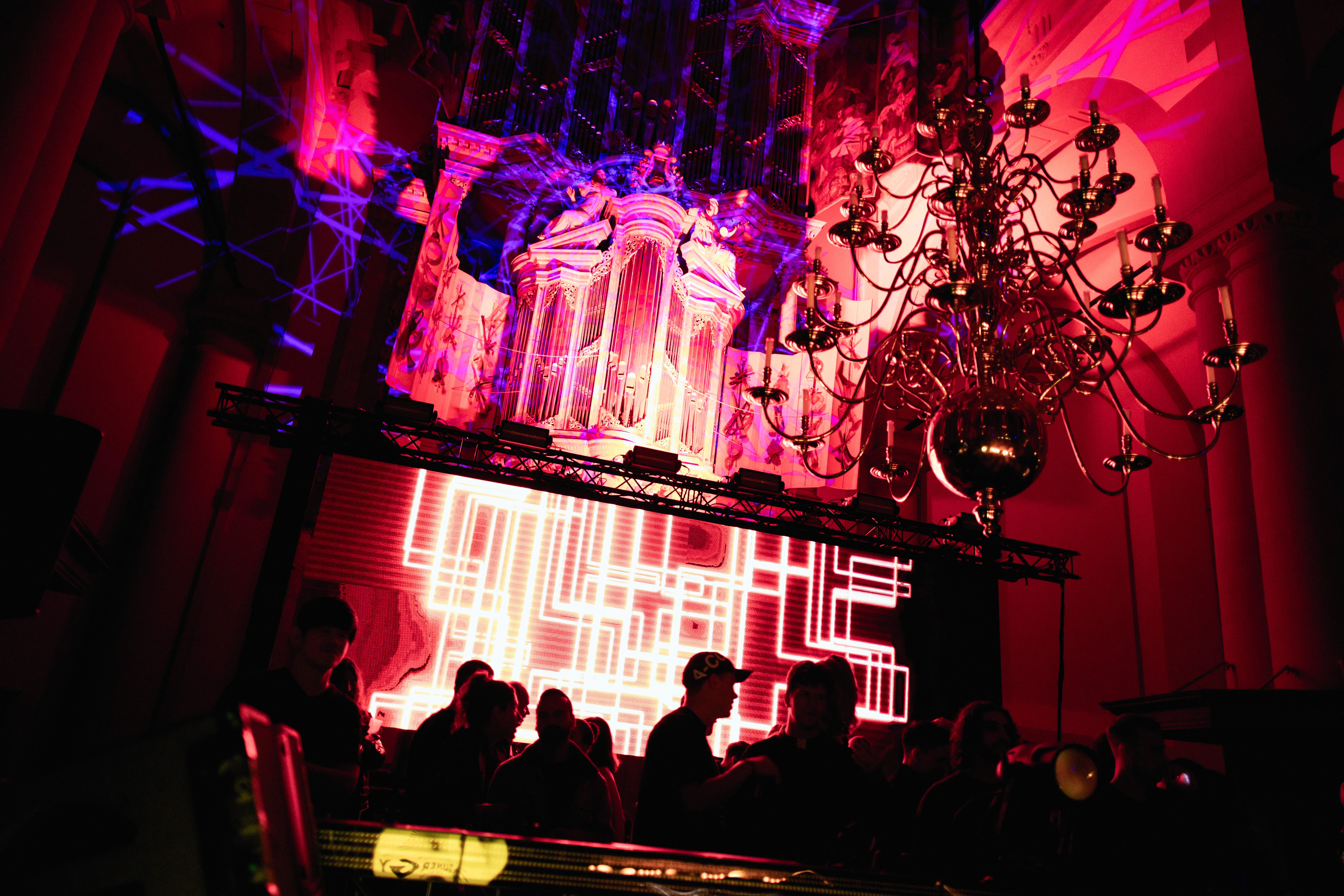 Streetside billboard with flyposters of the Batch.Works brand and illustrations