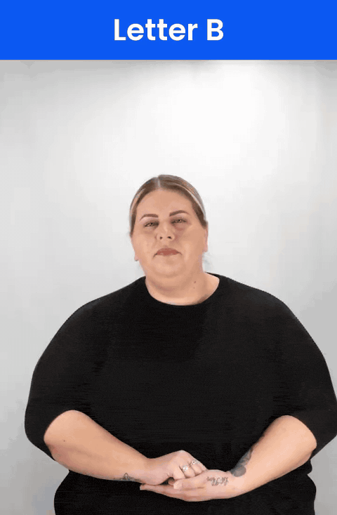 Animated GIF: a Deaf signer signs B in ASL, four straight fingers held up together, the thumb folded across the palm.