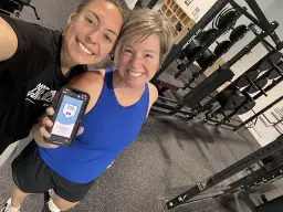 man in black hoodie standing