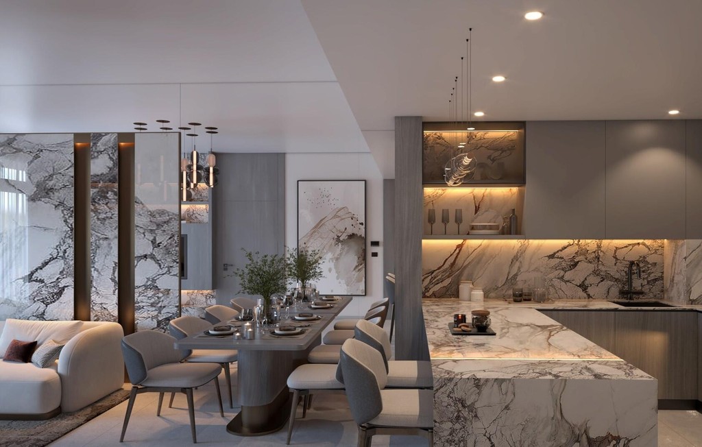 A modern living room featuring marble countertops and a dining area, designed by Vista by Vision.