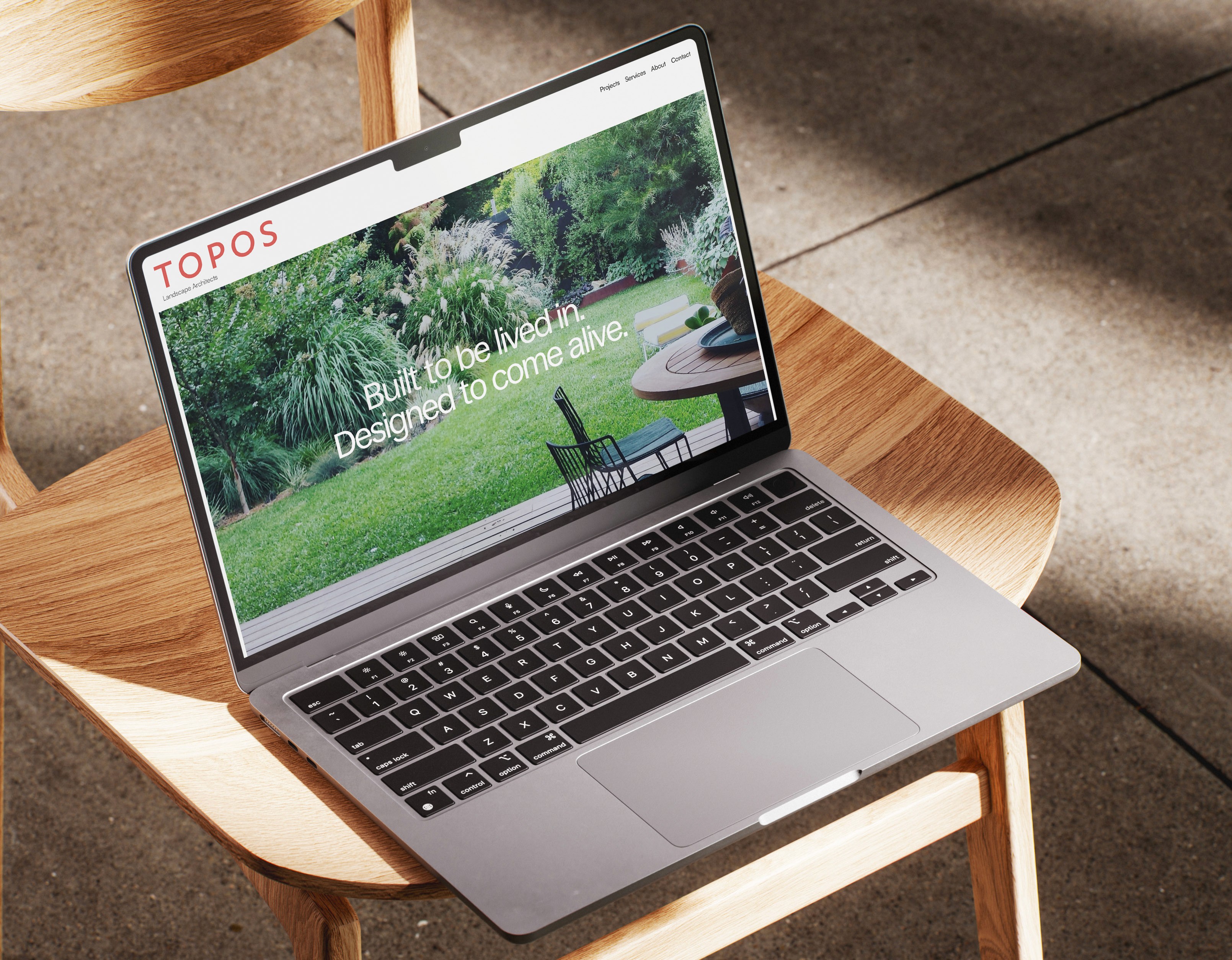 Laptop website mockup on chair