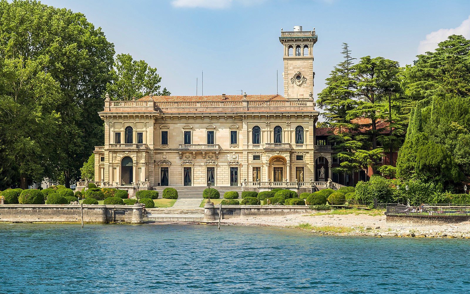 Historic villa on Lake Como shoreline during public tour.