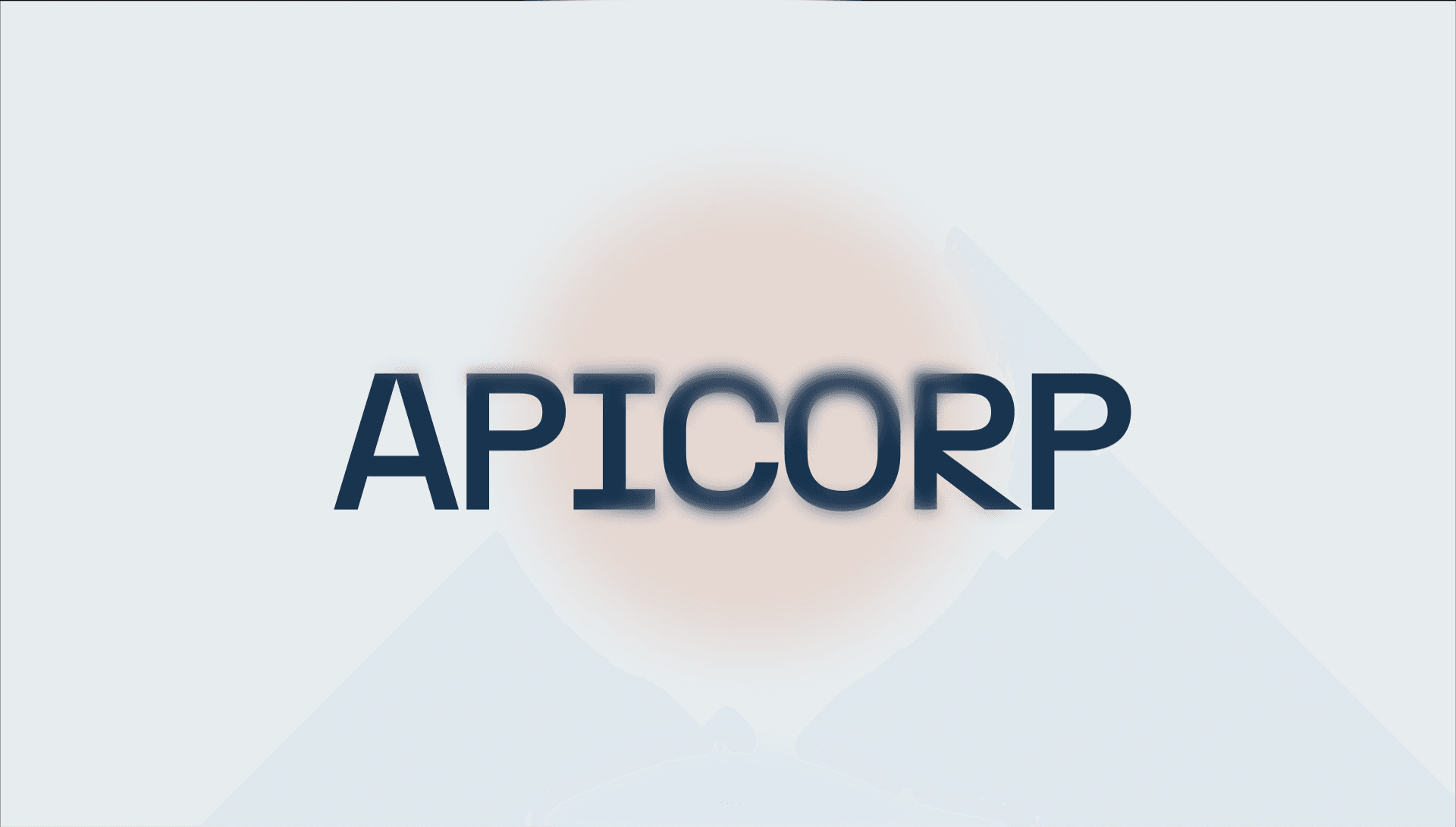 A dark glass bottle with a pump sits on a stone, surrounded by green leaves and textured background.