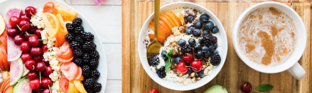 black and red cherries on white bowl