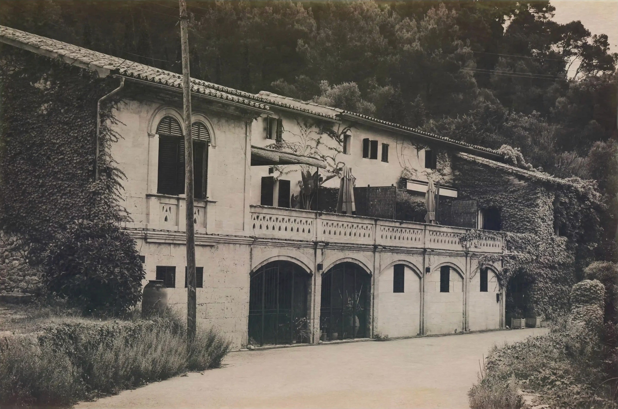 Streetside billboard with flyposters of the Batch.Works brand and illustrations