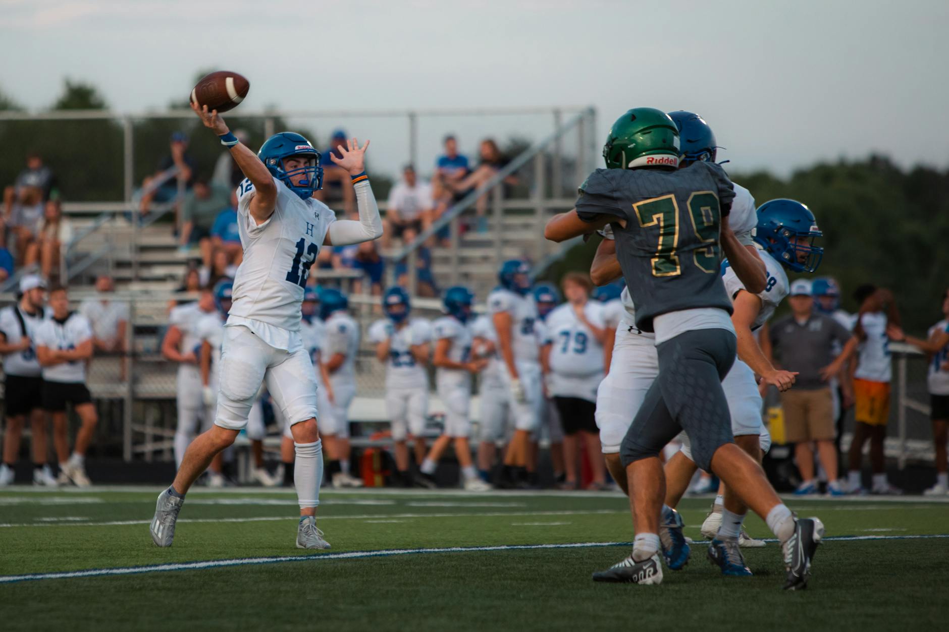 High school quarterback releasing a pass during practice