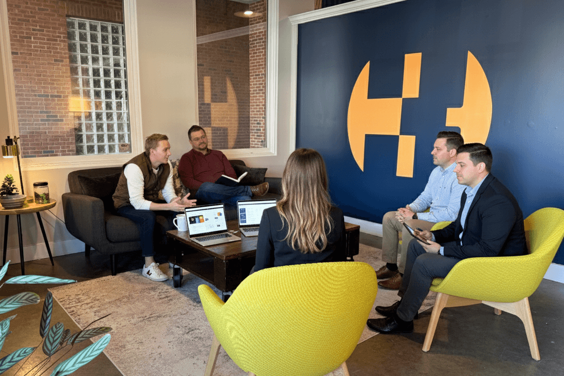 Aaron and Jason (left) meet with prospective clients (right)