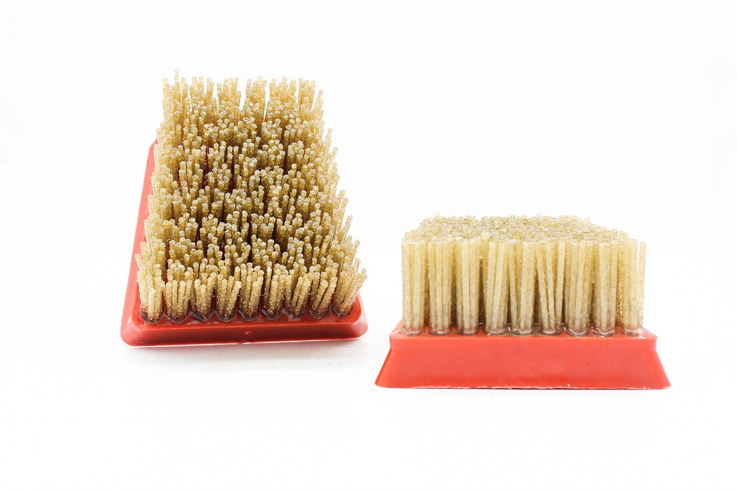 Diamond abrasive brush with densely packed bristles, side by side, showing the brush's texture.