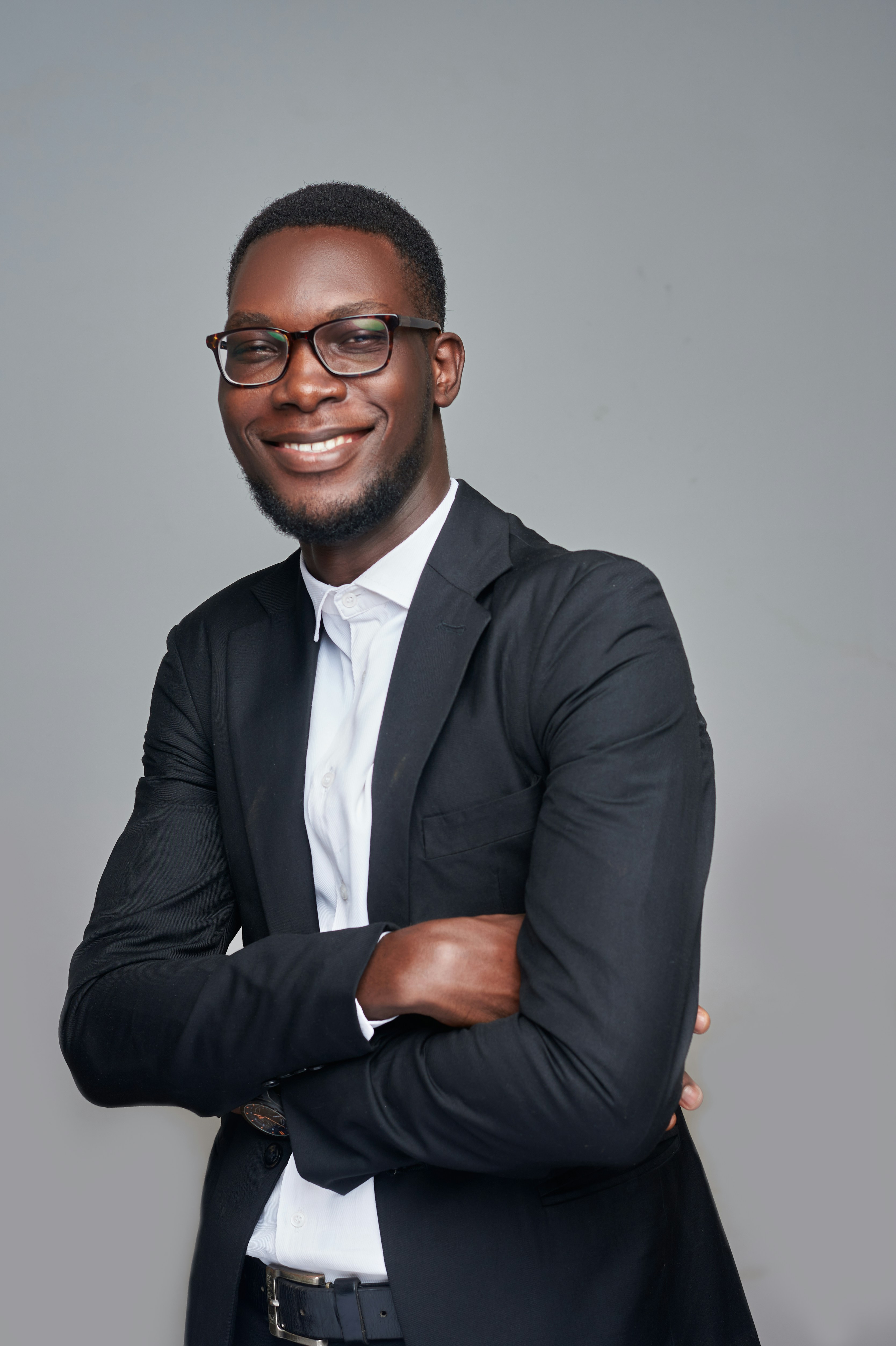 Image of a person wearing formal dress smiling