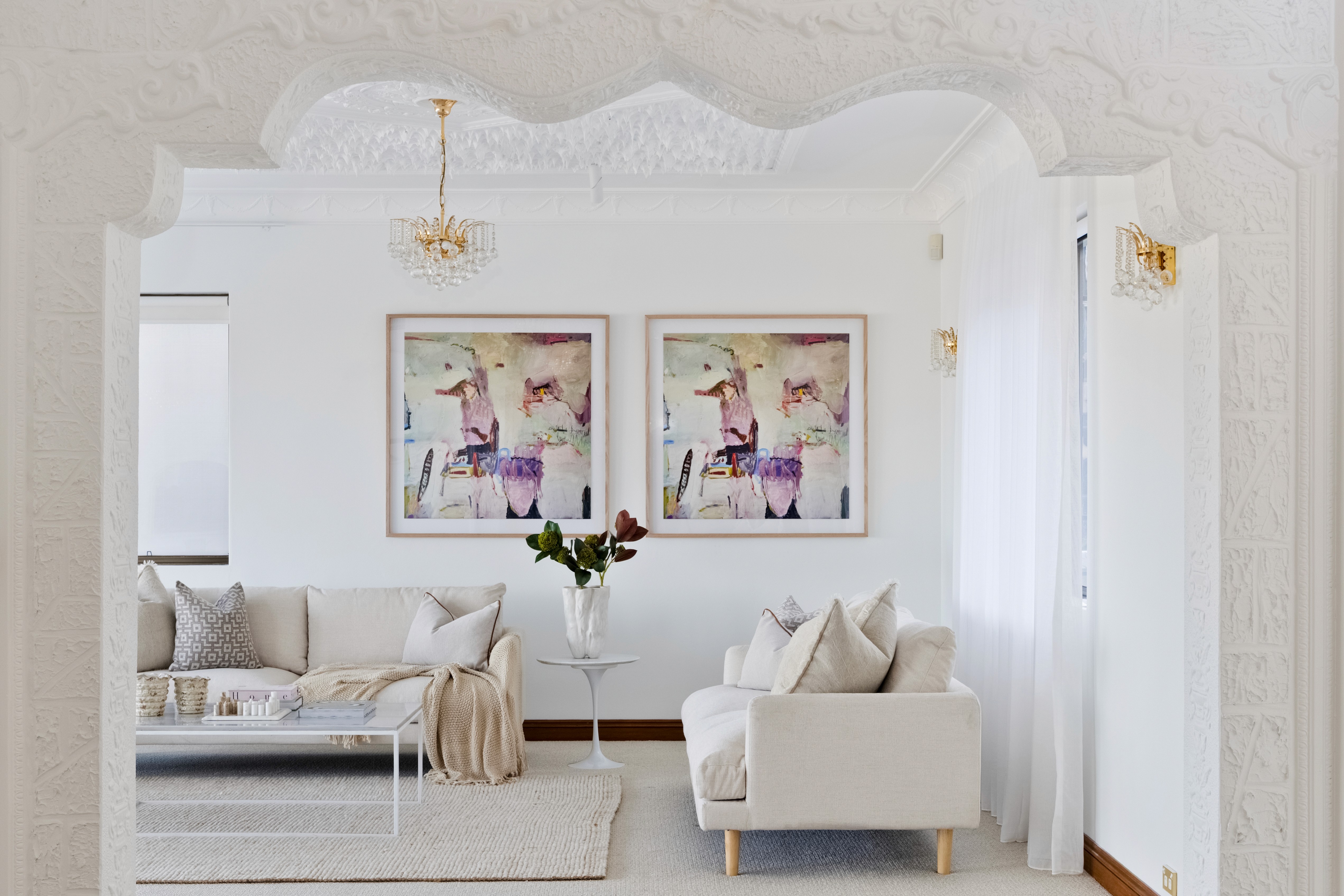 a large building with a red and white tower