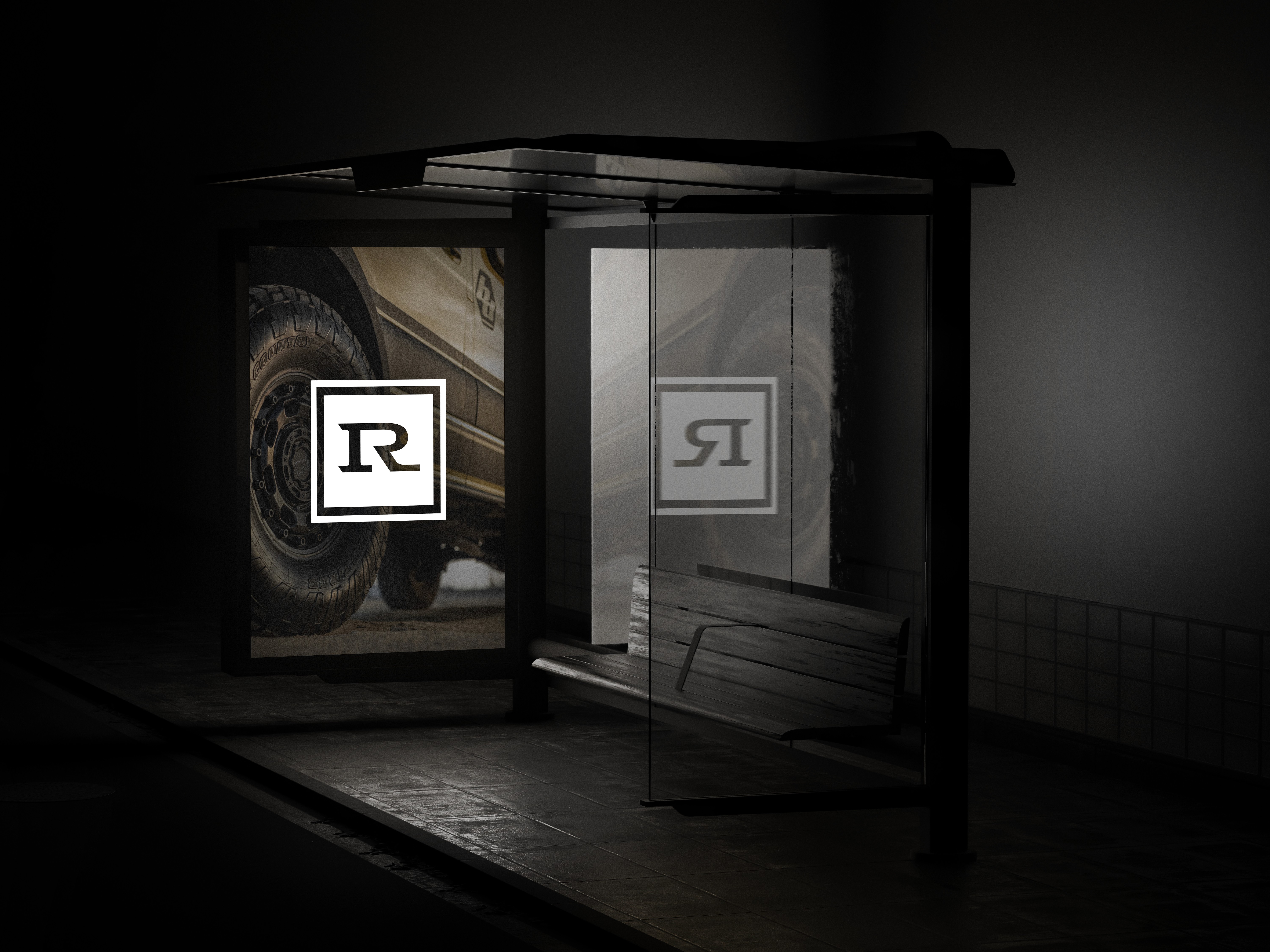 Rogue Vehicle Company monogram displayed in a dark interior environment