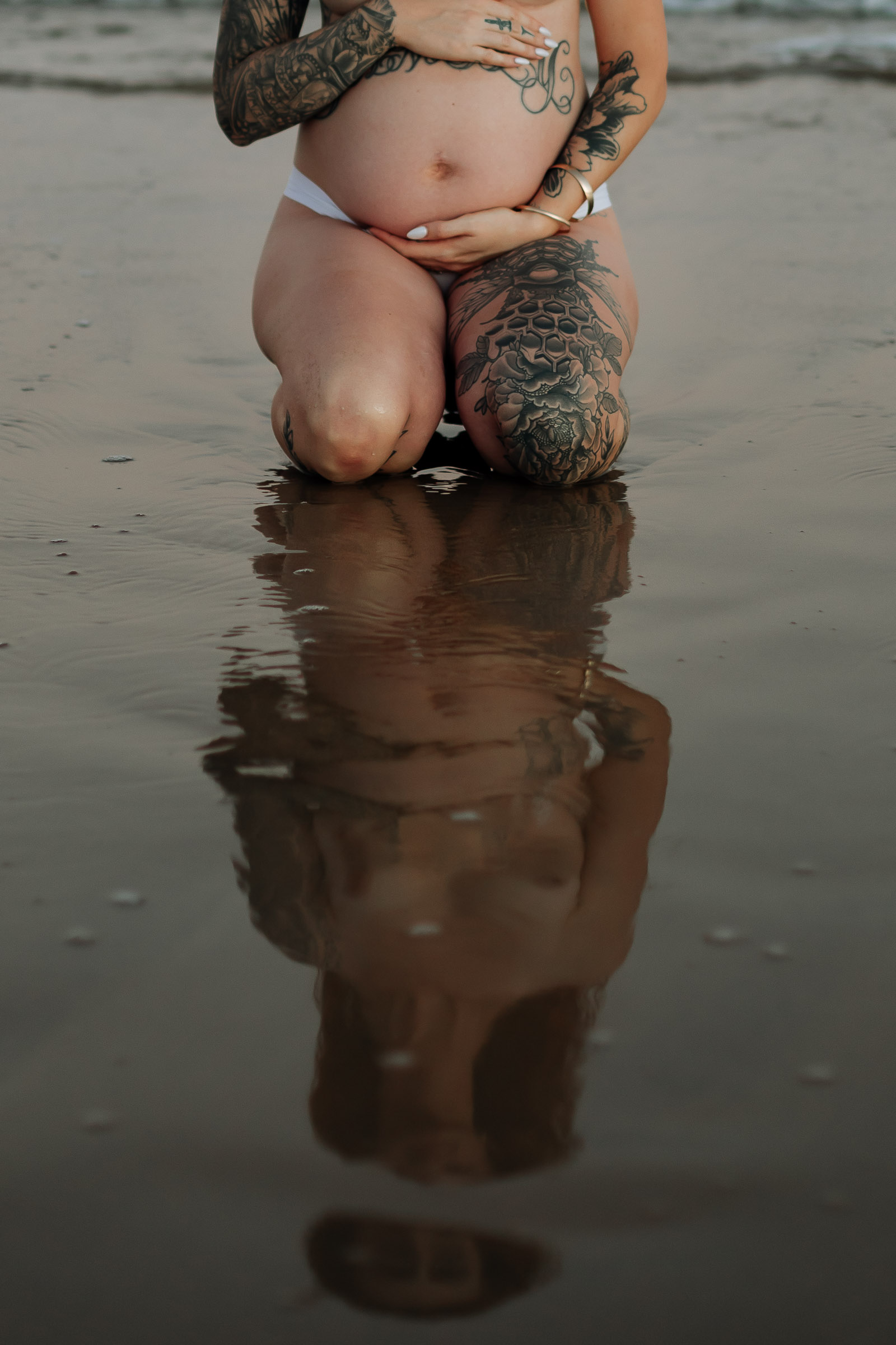 Editorial maternity photography session on Mackay beach at sunset