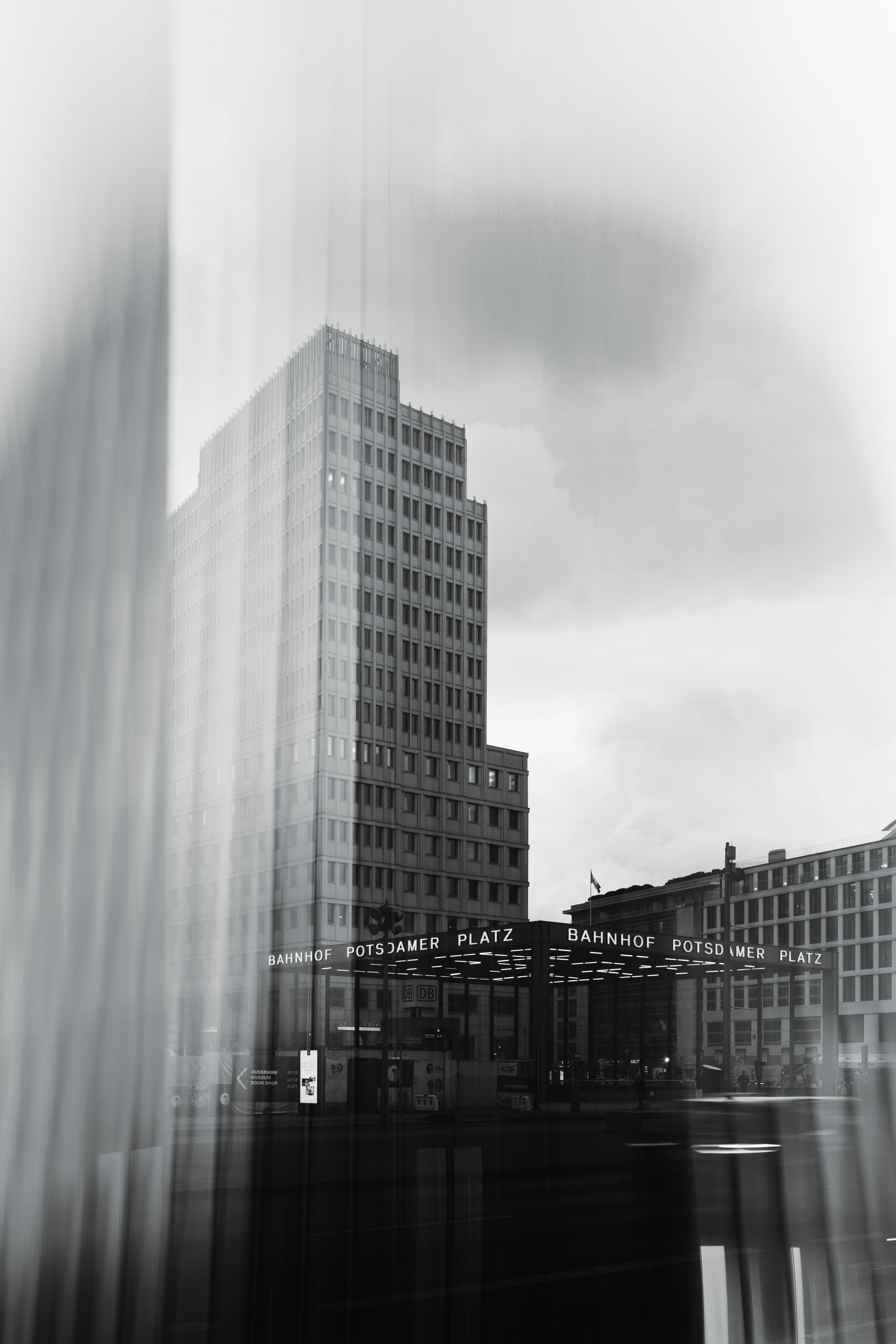 A high-rise building stands at potsdamer platz in berlin.