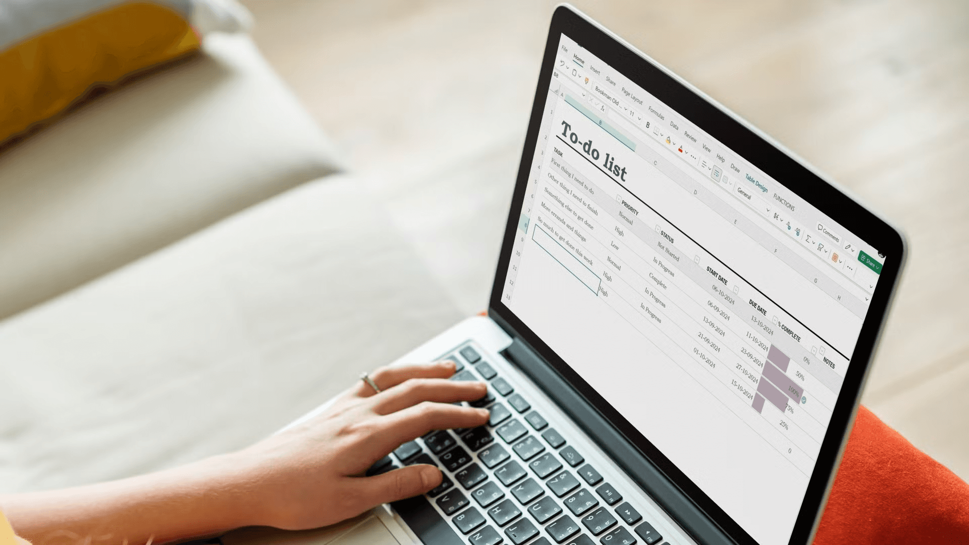 Person updating to-do list - How to Keep Track of Business Expenses and Income in Excel