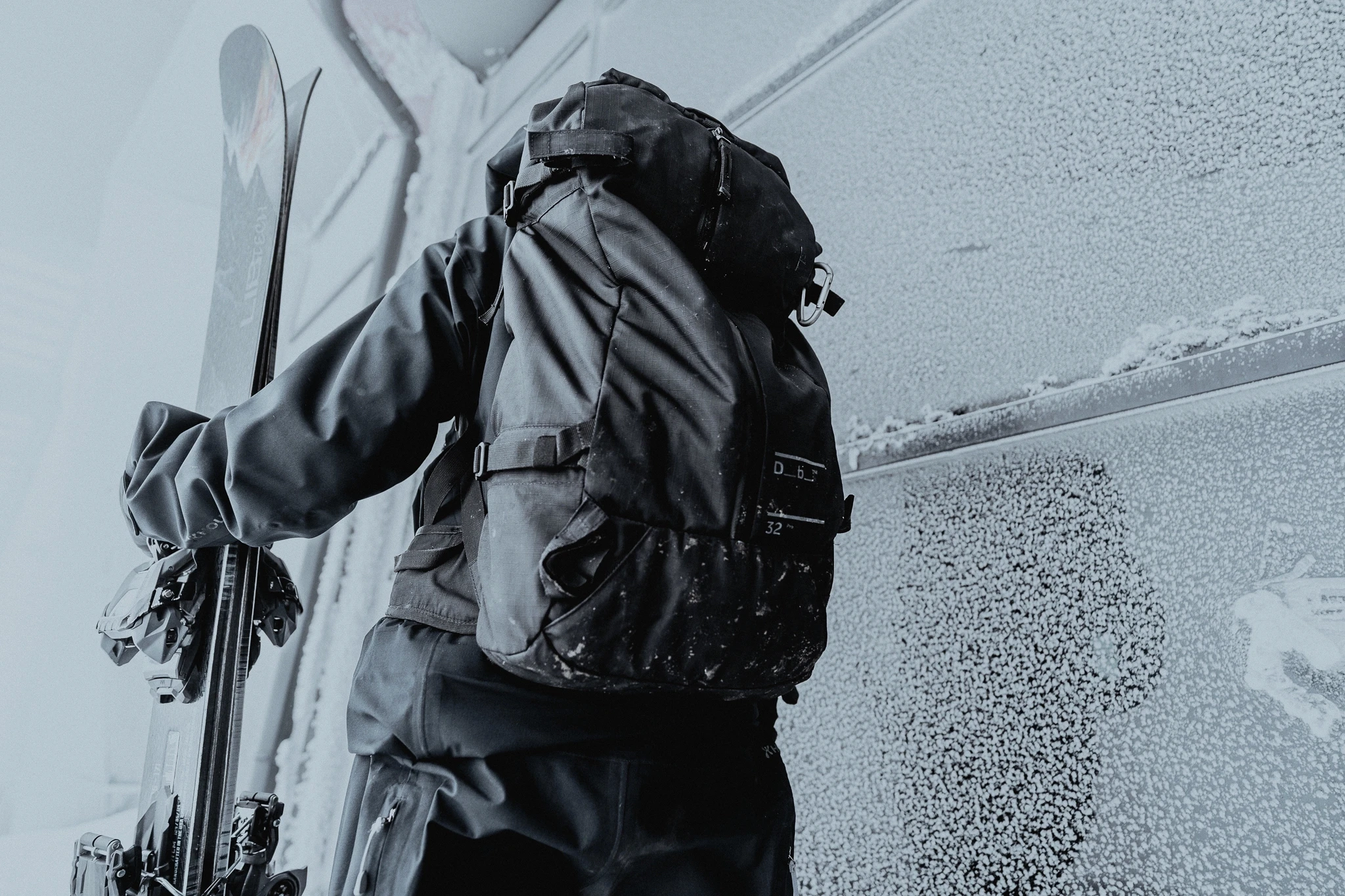 close look on key features of black backpack.