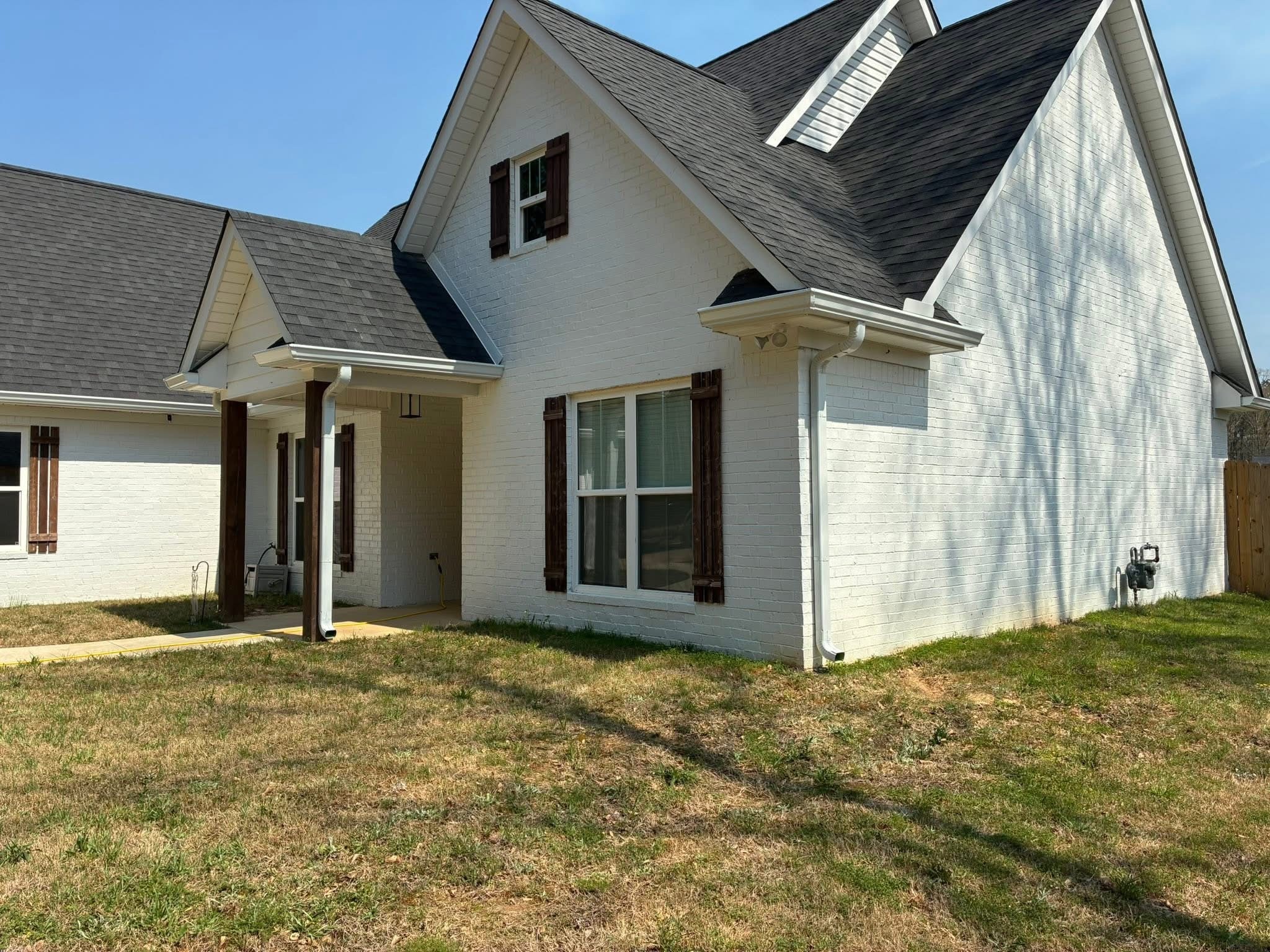 Finished seamless gutter on a home exterior in Starkville, MS